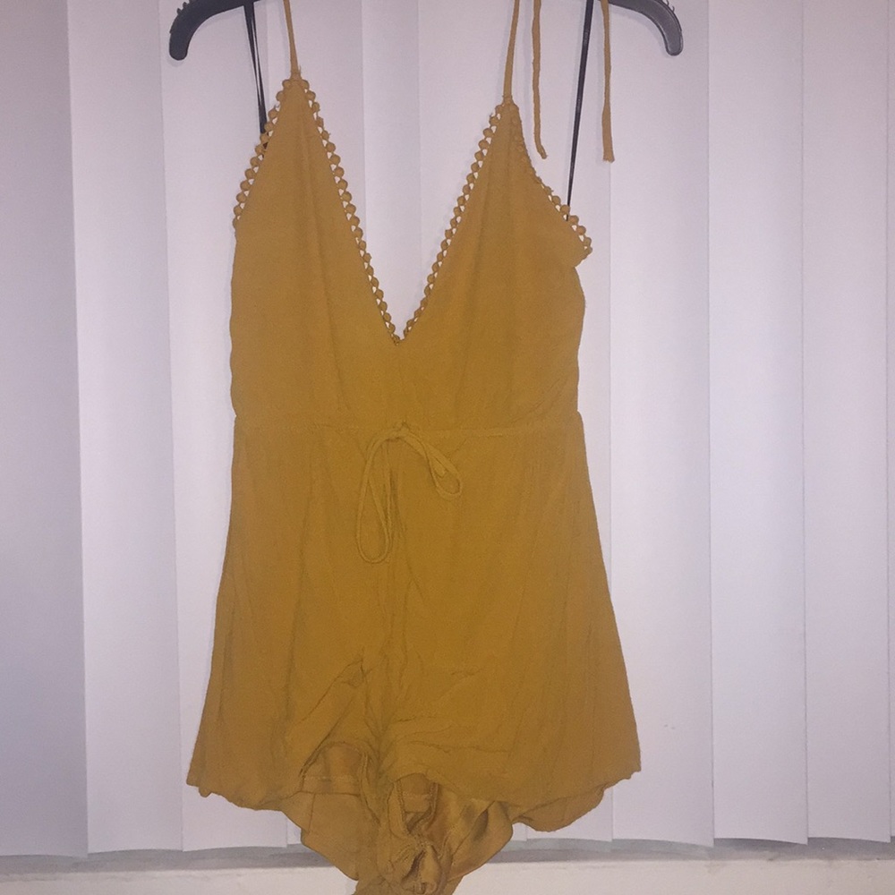 Yellow romper.